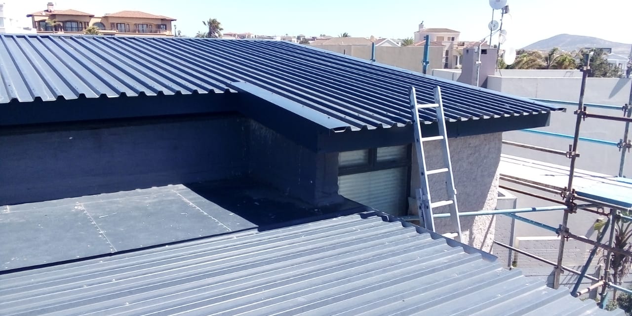 Roofing works on a flat and pitched roof